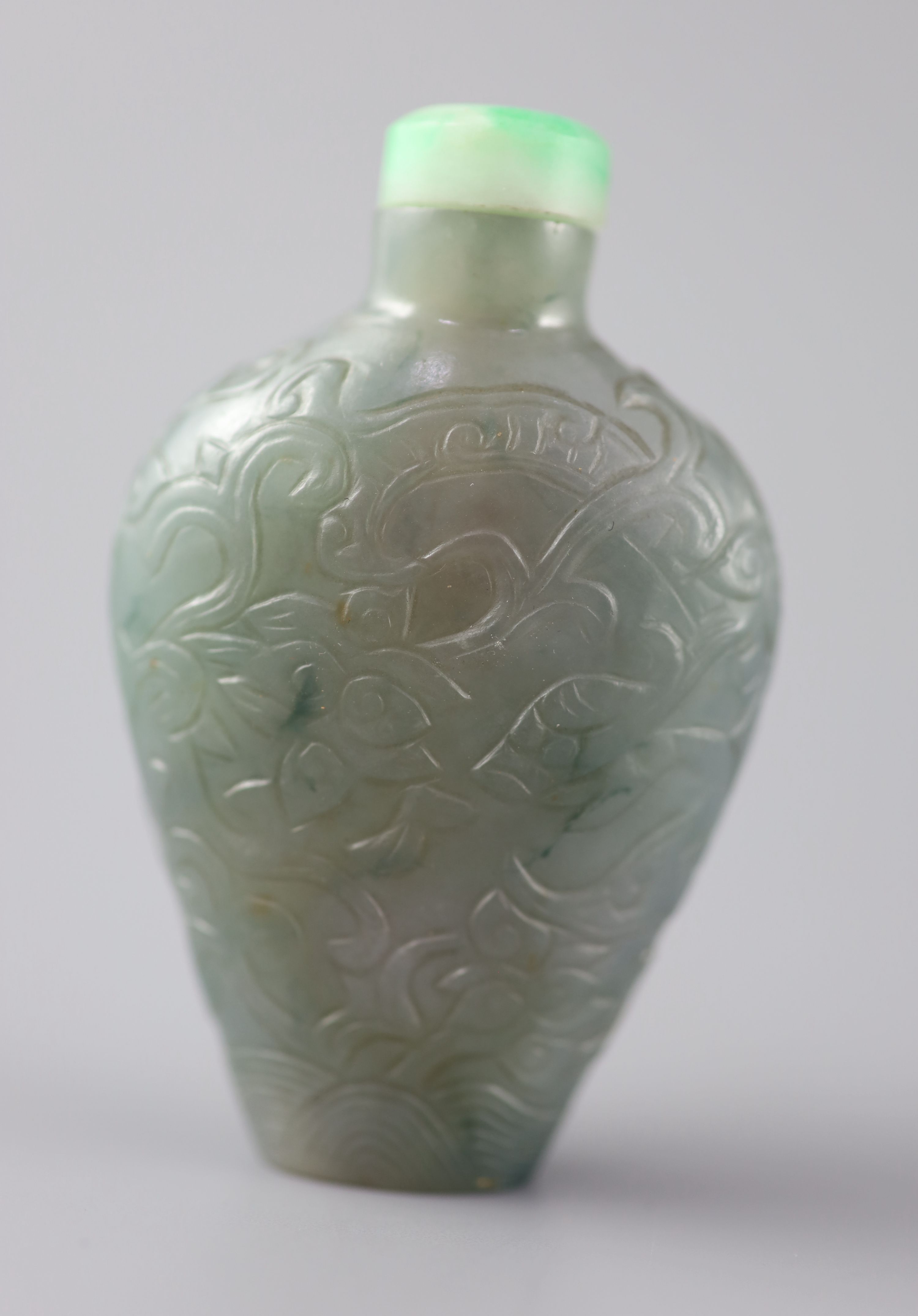 A Chinese blue-green jadeite snuff bottle, 1800-1900, 7.7cm including jadeite stopper,